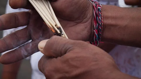 Man lighting matches Stock Footage 271223575