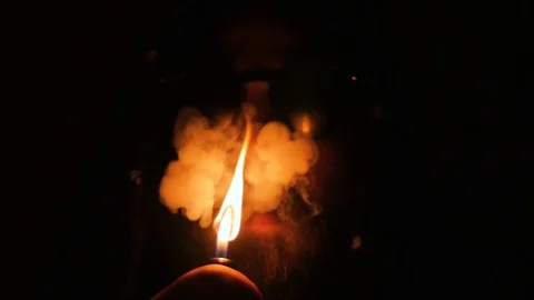 Man Lighting a Smoke in the Dark Stock Footage 87322000