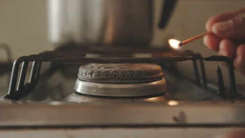 Man lighting stove Video stock 127502262