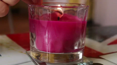 Man lights a candle Stock Footage 36238954