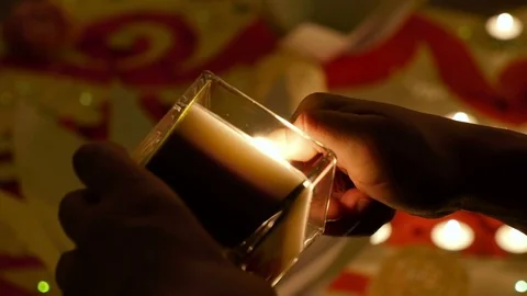 Man lights a candle Stock Footage 73240596