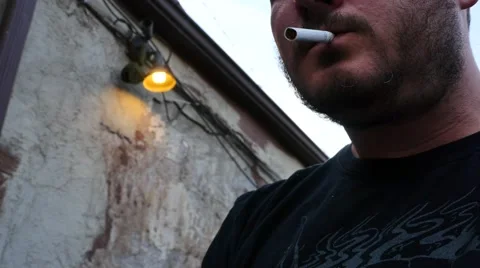 Man lights Cigarette Stock Footage 48435753