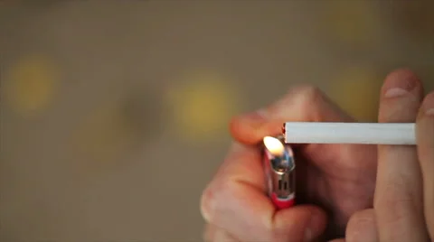 Man lights a cigarette lighter Stock Footage 68207748