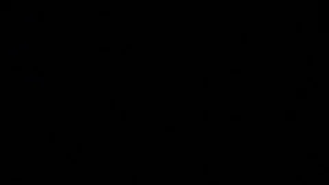 Man lights a match in darkness. Slow Motion Stock Footage 77160622