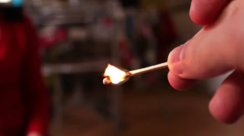 Man lights a match fire Stock Footage 36238555