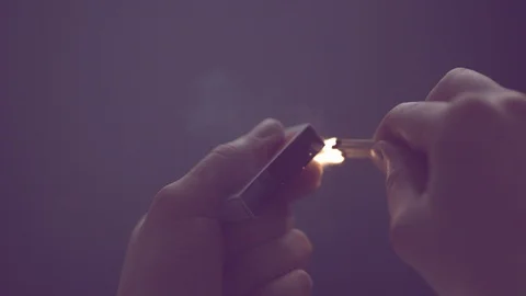Man Lights A Match In Slow Motion Stock Footage 121093448