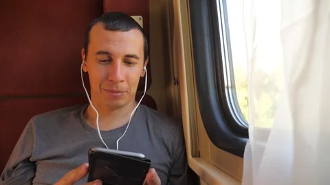 man listening to the music on the train ... | Stock Video | Pond5