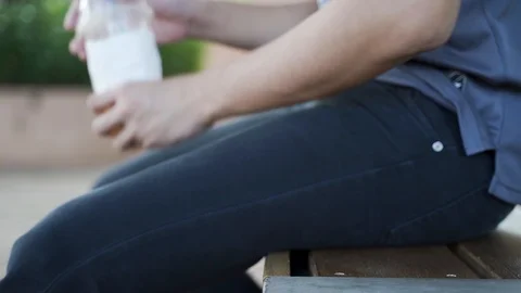 A man littering cup Stock Footage 119694256