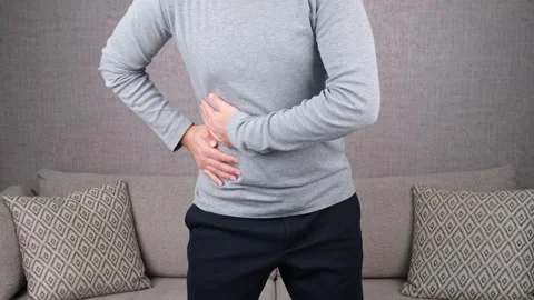 Man liver pain Stock Footage 264770261
