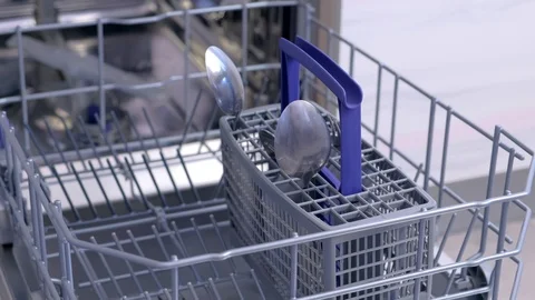 Man loading and unloading dishwasher white dishes, cutlery, high speed video. Stock-Footage 116857240