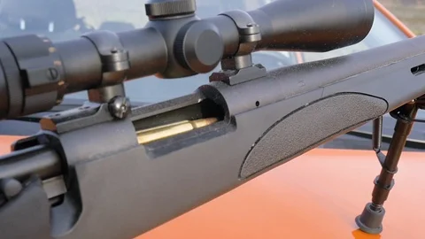 Man Loading a Semi Automatic Sniper Rifle Video stock 124981744