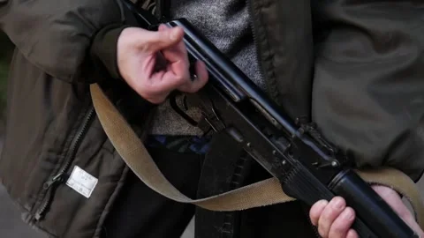 A Man Loading A Weapon (AK-74) Video stock 154276430