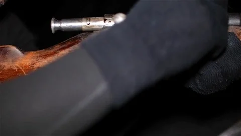 Man loads old rifle and fires. Smoke after shooting Vídeo Stock 72373262
