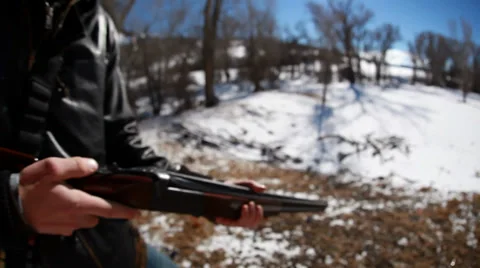 Man loads Shotgun Stock Footage 33722569