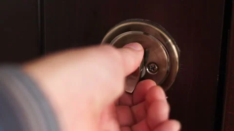 Man Locking Deadbolt Door Closeup Stock Footage 61835442