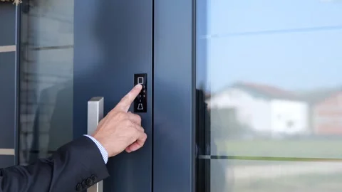Man Locking Main Door With Password Before Leaving Smart Home. - close up Stock Footage 259150163