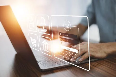 Man login and password on computer cyber security concept data protection ... Stock Photos