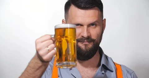 Man with a long twisted mustache, drinking beer Video stock 127091183