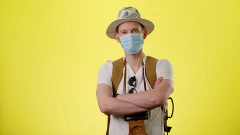 Man Look At Camera Wearing Protective Face Mask With Tourist Backpack Stock Footage 170184945