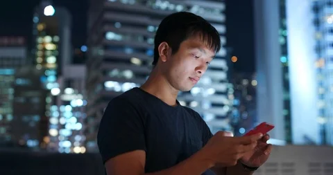 Man look at mobile phone Stock Footage 98629487