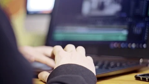 Man look at screen while editing a short movie Stock Footage 108002655