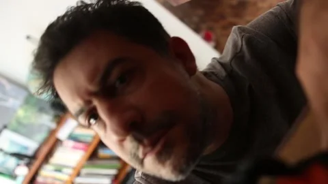 A man look for stuff inside a old wardrobe, looking down Stock Footage 239549082