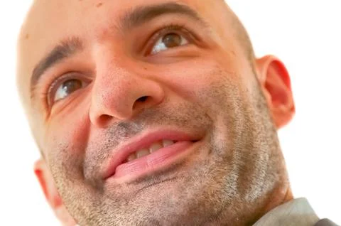 Man that look up in white background Stock Photos