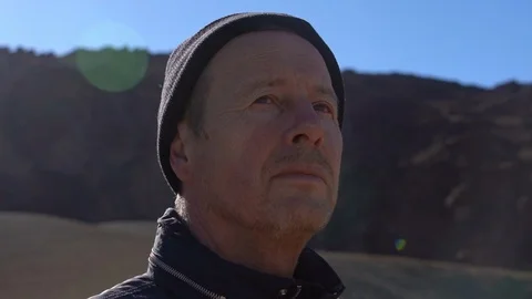 Man Looking Around Dry Arid Landscape Stock Footage 127065003
