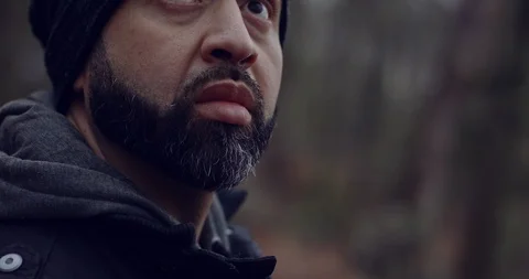A Man Looking Around a Forrest Stock Footage 124701184