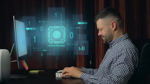 A man looking at artificial intelligence data on a desktop computer Stock Footage 258389250