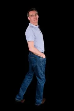 Man looking backwards over shoulder Stock Photos