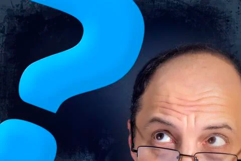 Man looking to big question mark Stock Photos