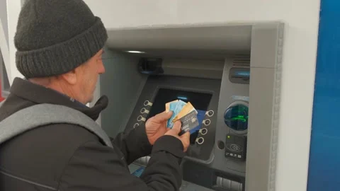 Man looking at big stack of credit cards Stock Footage 168232388