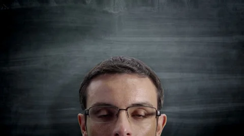 Man looking up at blackboard with copyspace Vídeo Stock 32721108