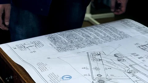 Man looking the blueprints Stock Footage 91074361