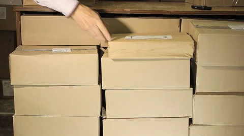 Man looking for a book in the library card catalog Stock Footage 65287972