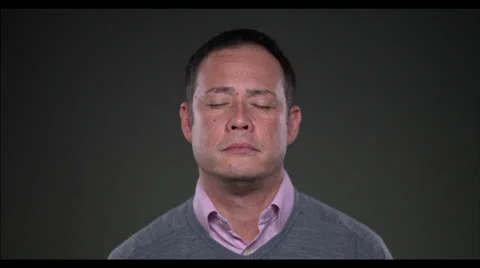 Man looking at camera and opening eyes Stock Footage 22509555