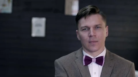 Man looking at the camera and smile Stock Footage 79610833