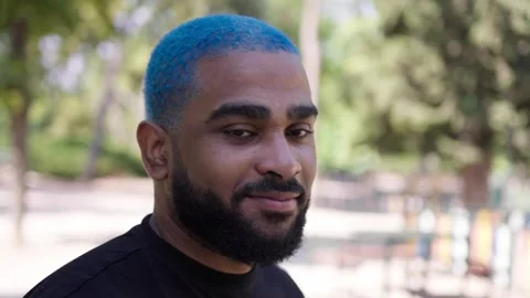 Man looking at camera and wearing a protective COVID-19 mask 스톡 동영상 287487458