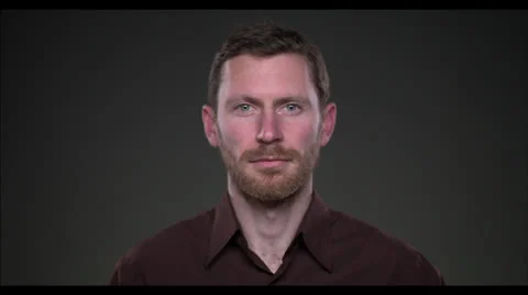 Man looking at camera Stock Footage 22596174