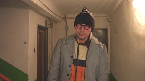 The man is looking at the camera. Stock Footage 73901639