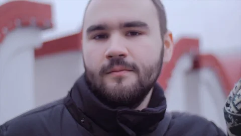 The man is looking at the camera Stock Footage 74506581