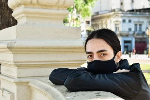 Man looking to the camera, with a mask Stock Photos