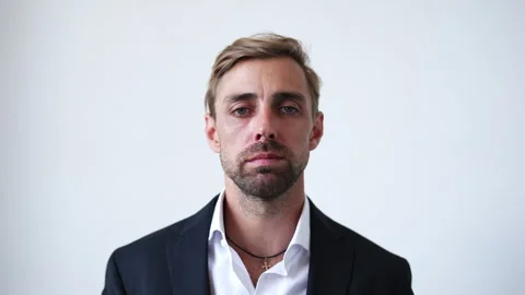 The man looking at the camera, portrait a young man in business clothes Stock Footage 280086258