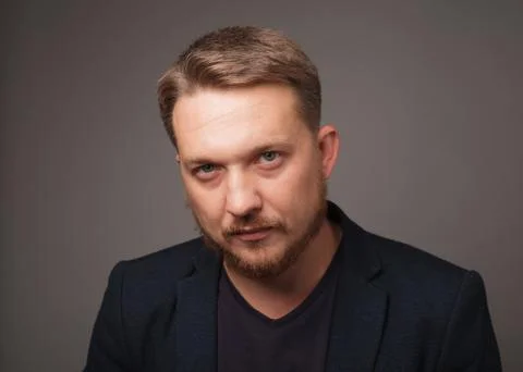 Man looking at camera with a sad look Stock Photos