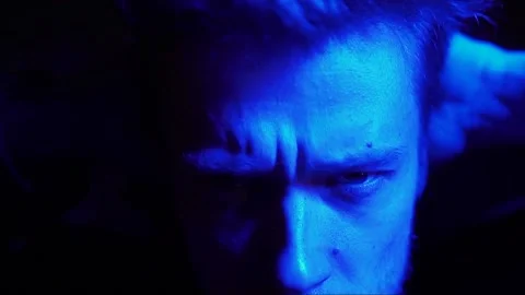 Man looking at camera under drugs Video stock 230432370
