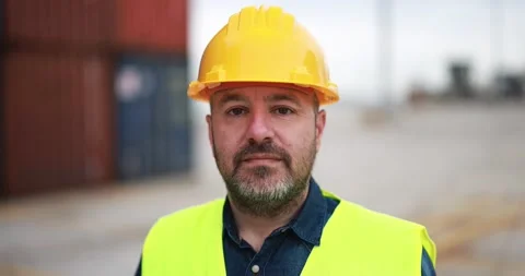 Man looking on camera working at freight terminal port on background Stock Footage 179970708