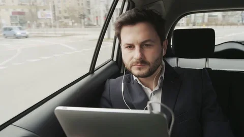 Man Looking Carefully Through a Window. The Car Stops Stock Footage 74499210