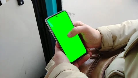 Man looking into a chromakey display Stock Footage 218973130