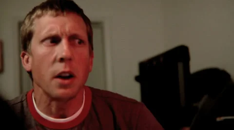 Man looking at computer with frightened look Stock Footage 32708919